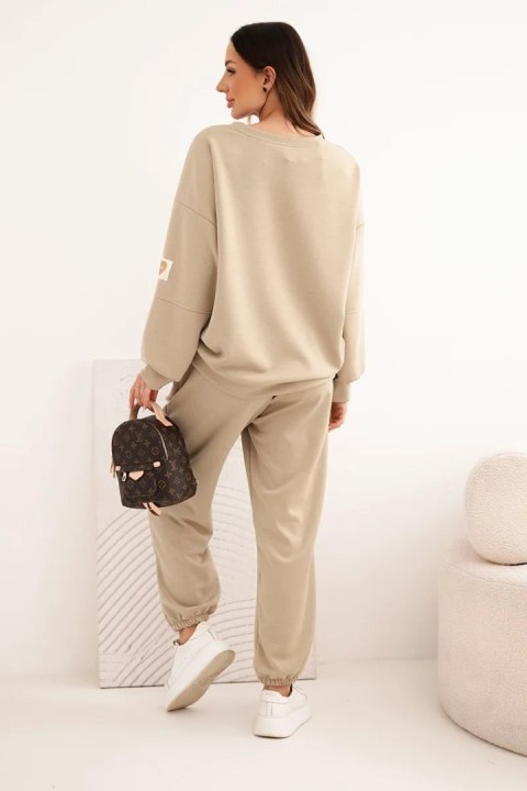 Komplet damski masełkowy z luźną bluzą i spodniami z napisem LOVE ciemno beżowy
