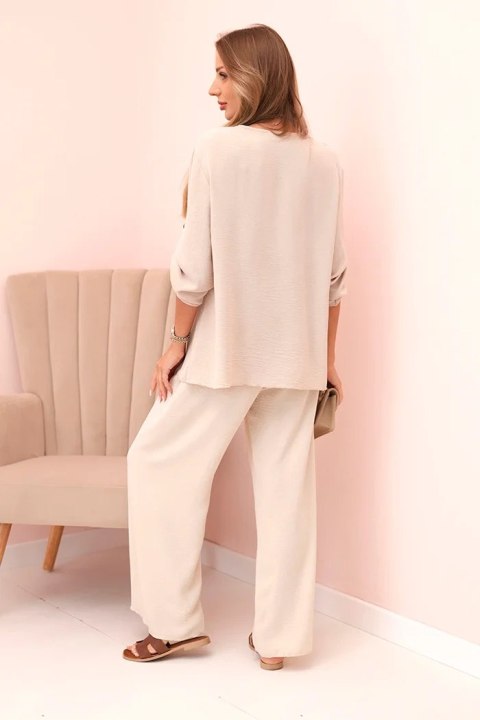 Komplet damska z bluzką z naszyjnikiem i szerokimi spodniami beżowy