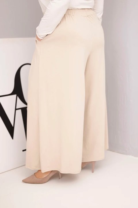 Spodnie damskie bawełniane Plus Size o szerokiej nogawce i luźnym kroju beżowe