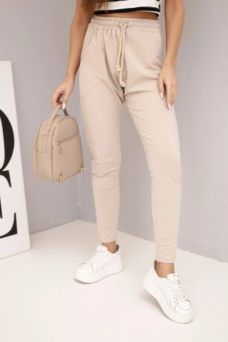 Spodnie damskie dresowe z elastycznym pasem i troczkiem beżowe