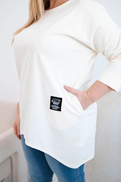 Bluzka damska Plus Size z dłuższym tyłem i długim rękawem jasno beżowa